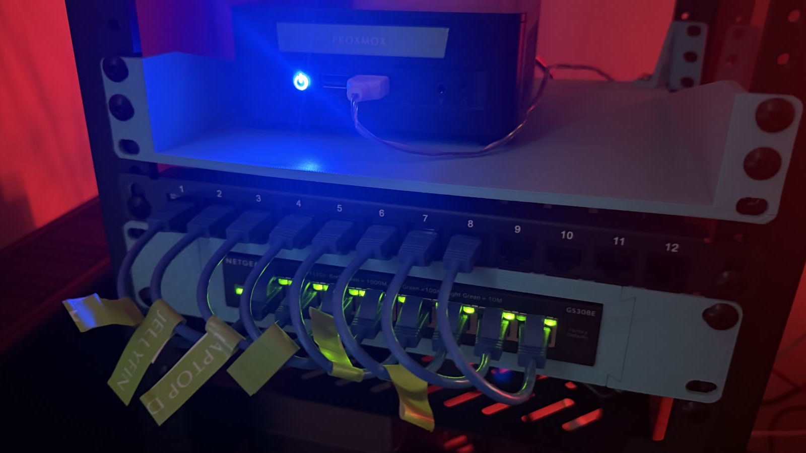 Network switch and Proxmox Linux system in my homelab rack.